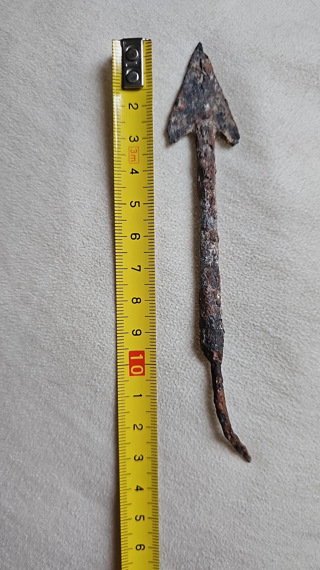 Iron arrowhead offered in the charity auction
